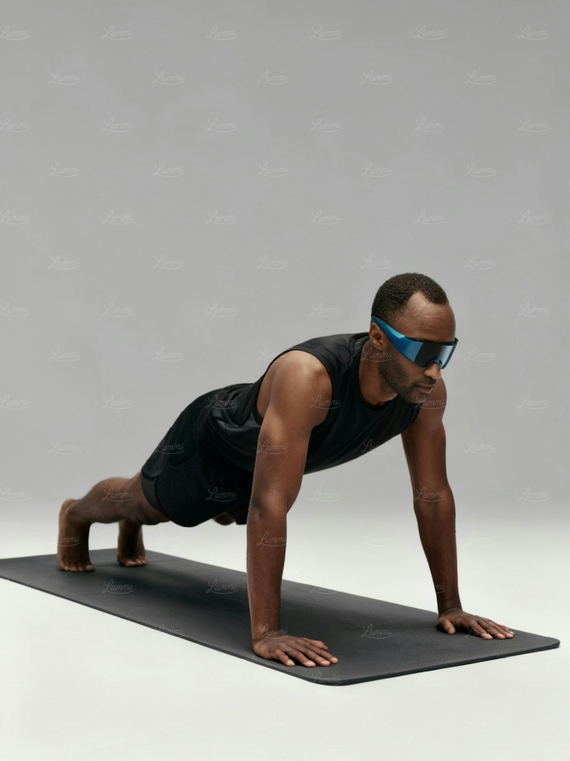 A woman demonstrating a perfect plank, an effective anti-extension exercise for deep core strength and stability.