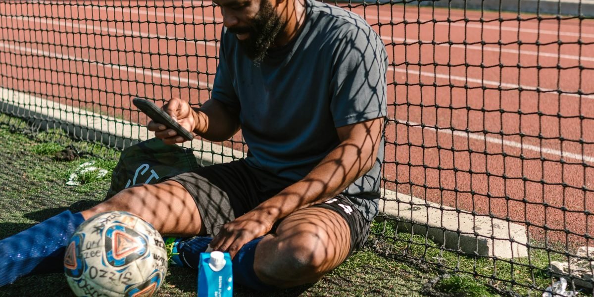 An athlete focusing on recovery and maintaining physical health after an intense workout session.