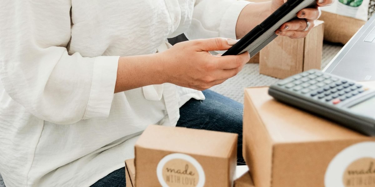 A person carefully reads and compares product labels to make an informed decision about supplements.