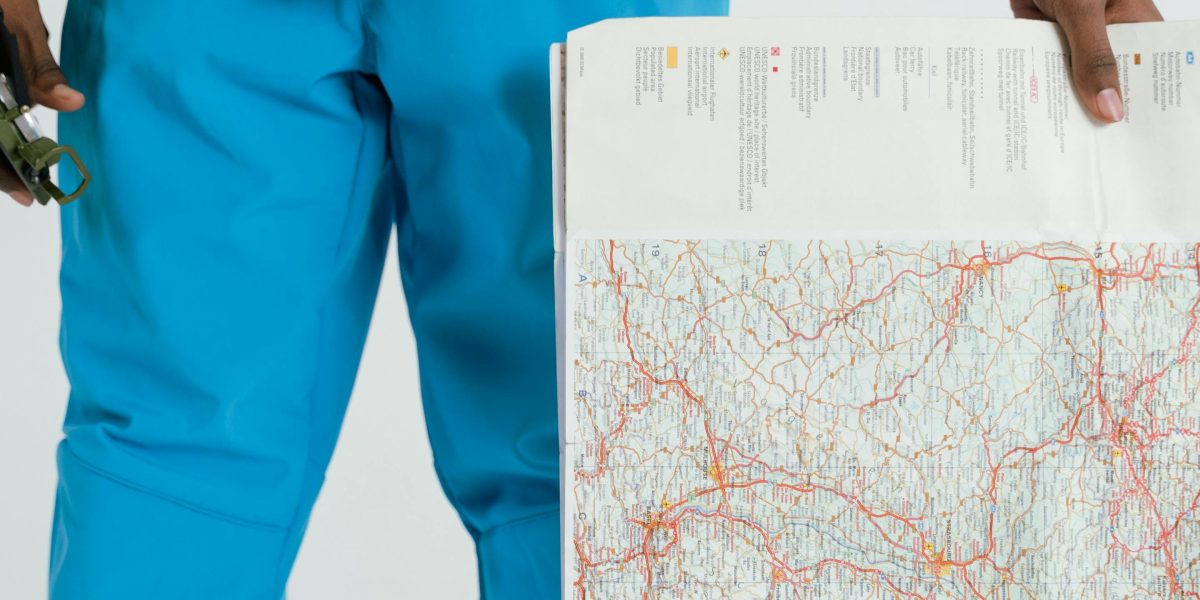 A person reviewing demographic data and traffic patterns to choose an ideal gym location.