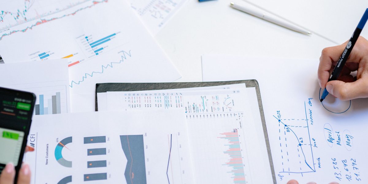 Researchers analyzing data and discussing findings, representing the scientific backing behind exercise recommendations.