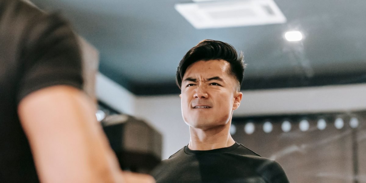 A man demonstrating vigor and strength post-workout, highlighting the benefits for an active lifestyle.